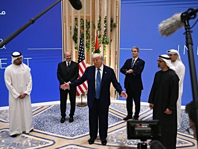 trump qatar US President Donald Trump (C) speaks as and US Secretary of Commerce Howard Lutnick (2nd-L