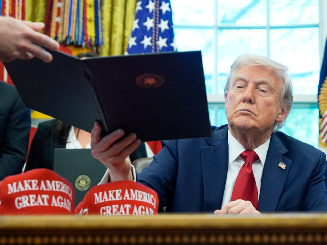 Trump Signing Executive Orders Downloaded 5/10/25