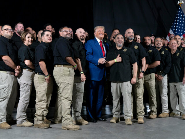 Trump with US Border Patrol Council U.S. Republican presidential nominee, former President Donald Trump poses for a picture wi