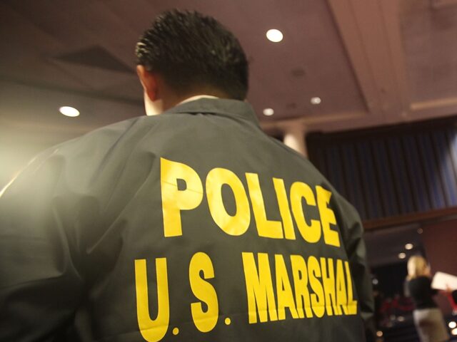 <> on November 13, 2009 in New York, New York. NEW YORK - NOVEMBER 13: A U.S. Marshal looks on during a press preview of a U.S. Marshals