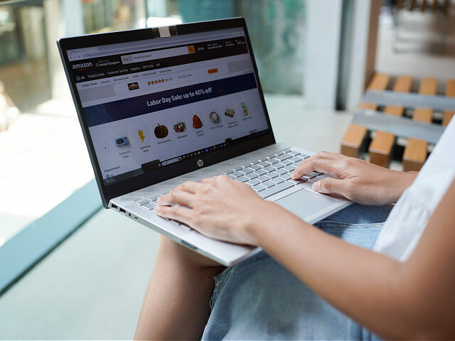 amazon-shopping-computer-filephoto-getty CHINA - 2024/09/29: In this photo illustration, a woman browses the Amazon website on her
