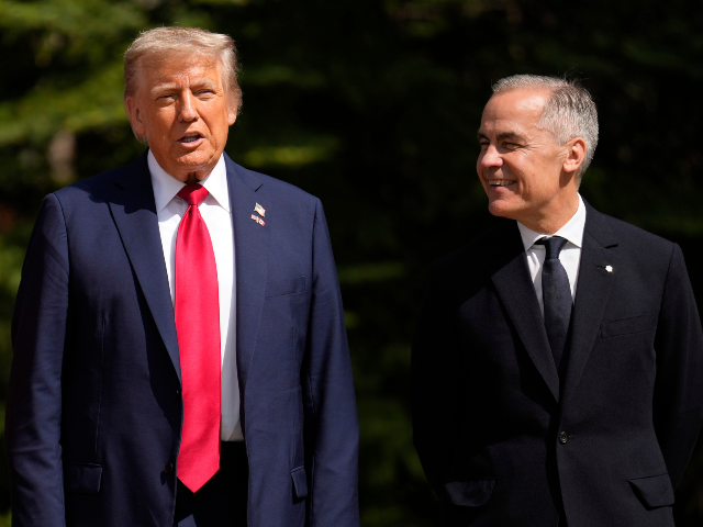 AP25167656236390 Canada's Prime Minister Mark Carney, right, greets President Donald Trump during the offic