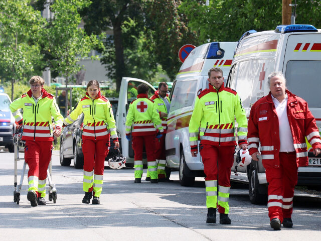 Austria school shooting Rescue service personnel attend the scene of a shooting at a school in Graz, Austria, Tues