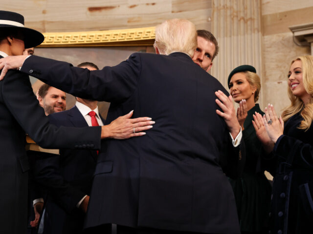 Donald and Eric Trump Hugging Donald Trump hugs his children after taking the oath of office during inauguration ceremon