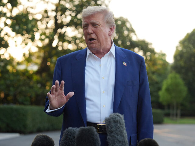 Donald Trump President Donald Trump speaks with reporters before boarding Marine One on the South Lawn