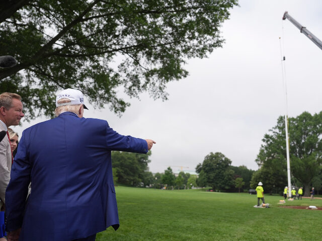 Donald Trump Flagpole at White House President Donald Trump looks on as a flag pole is installed on the South Lawn of the White