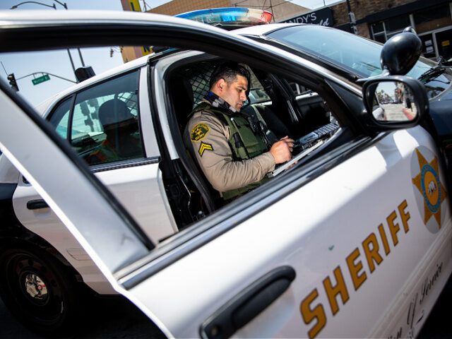 file2021-los-angeles-county-sheriff-cruiser-getty LOS ANGELES, CA - April 16: Los Angeles County Sheriffs deputy Manan Butt prepares to issu