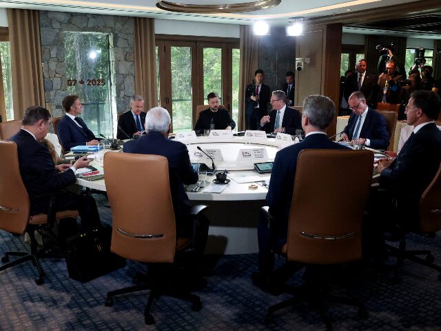 Downloaded June 18, 2025 Canadian Prime Minister Mark Carney, 3rd left, Ukrainian President Volodymyr Zelenskyy, ce