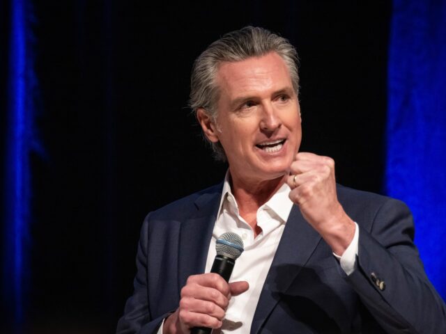 gavin newsom trump East Los Angeles, CA - February 26:Gov. Gavin Newsom speaks with Economic Development Corp