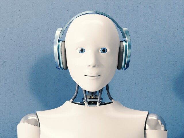 GettyImages-1073802514 Robot wearing headphones.