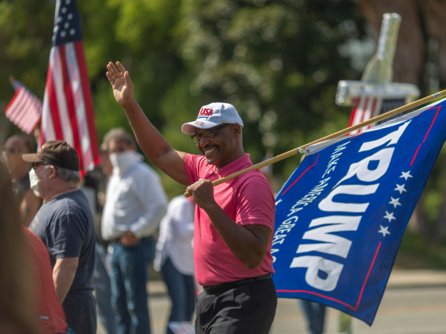 GettyImages-1213388760 WOODLAND HILLS, CA - MAY 16: Supporters of President Donald Trump rally to reopen Californ