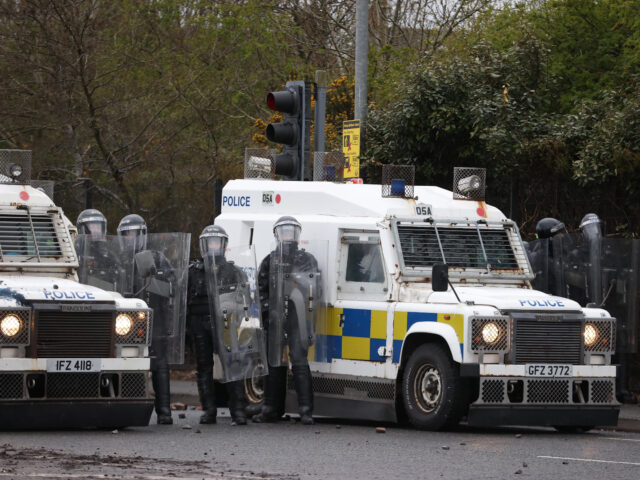 gettyimages-1232184017-1-640x480-1 PSNI officers with riot shields on the Springfield road, during further unrest in Belfast.