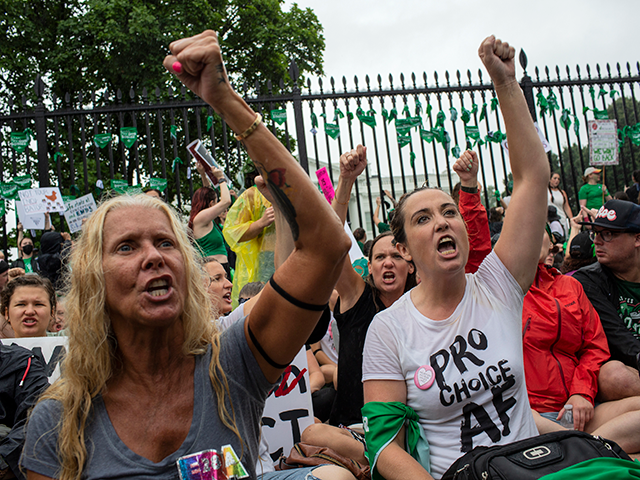 gettyimages-1241815238-640x480-1 Abortion-rights activists shout slogans My Body My Choice in front of the White House duri