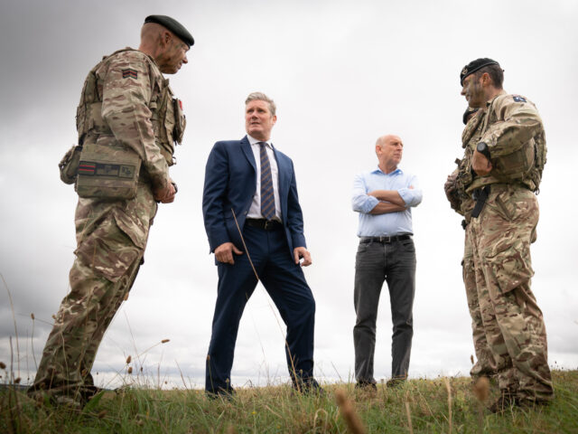 gettyimages-1242686122-1-640x480-1 Labour leader Sir Keir Starmer and shadow defence secretary, John Healey (centre right) me