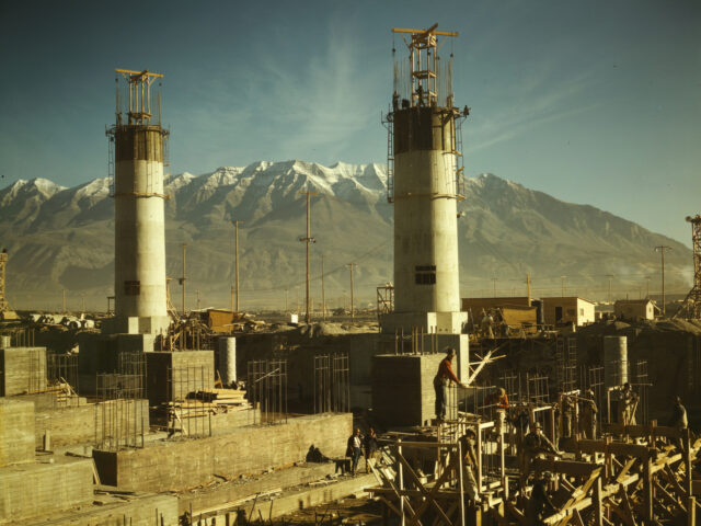Partly finished open hearth furnaces and stacks for a steel mill under construction which