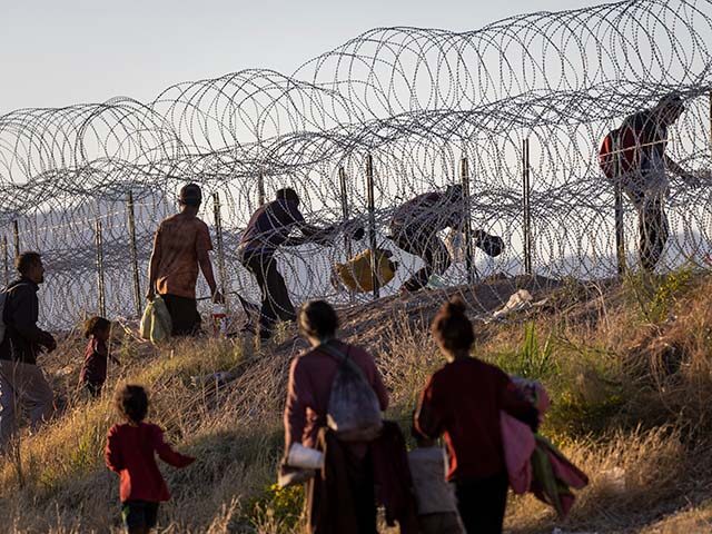 gettyimages-1488575554-640x480-1 Immigrants cross into the United States from Mexico hoping to be processed by U.S. border