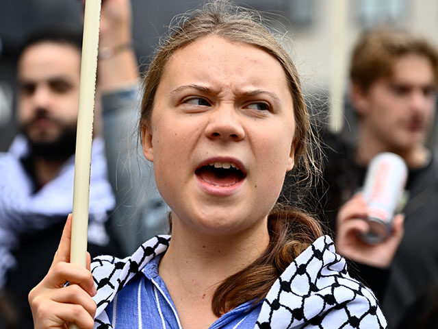 gettyimages-2172611963-640x480-1 Swedish climate activist Greta Thunberg, wearing a checkered head scarf (kaffiyeh or keffi