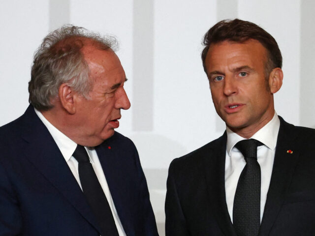 gettyimages-2209838405-1-640x480-1 France's President Emmanuel Macron (R) speaks with France's Prime Minister Francois Bayrou