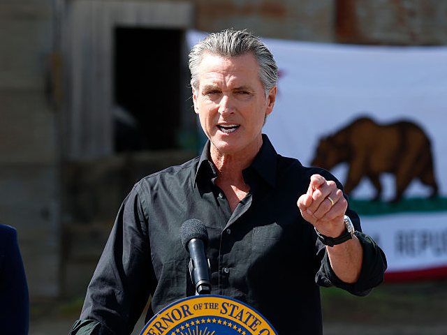 GettyImages-2210604118 CERES, CALIFORNIA - APRIL 16: California Governor Gavin Newsom (R) speaks as California At