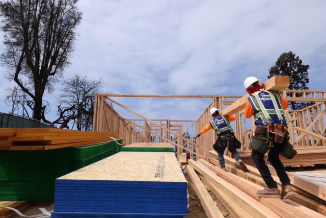 Sen. Alex Padilla, Pacific Palisades, fire PALISADES, CA - APRIL 24, 2025 - - Workers carry lumber while helping to construct the