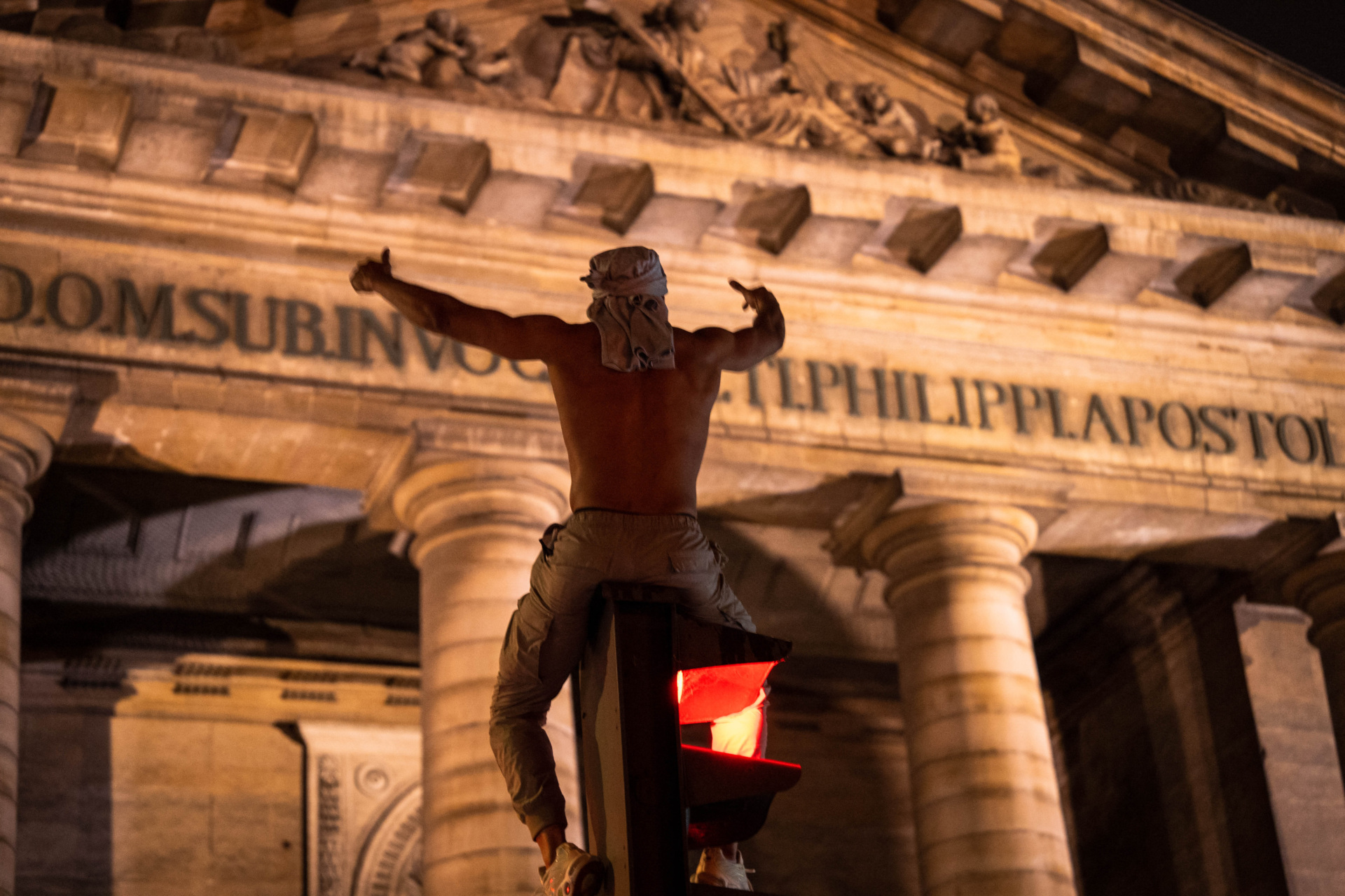gettyimages-2217368255 A Paris Saint-Germain (PSG) supporter celebrates in Paris early June 1, 2025, following their 5-0 victory in the UEFA Champions League final football match against Inter Milan held in Munich. (Photo by Nael Chahine / Middle East Images / Middle East Images via AFP) (Photo by NAEL CHAHINE/Middle East Images/AFP via Getty Images)