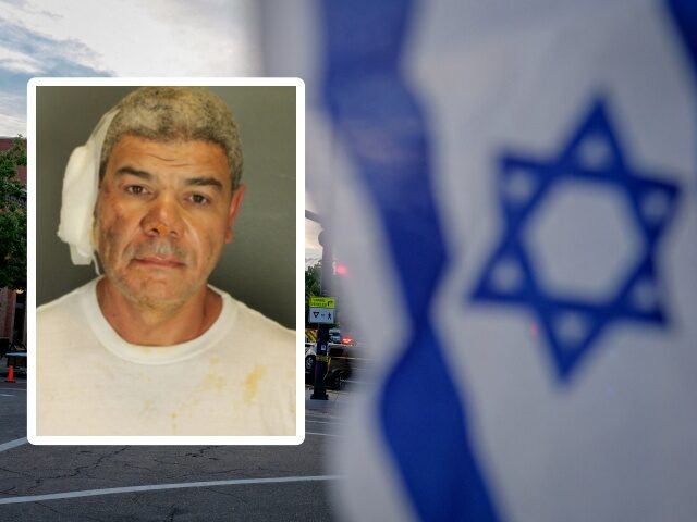 An Israeli flag is fixed to a street sign as police stand by off Pearl Street on the scene