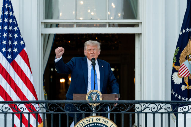 US President Donald Trump on the Truman balcony during a Summer soiree on the South Lawn o