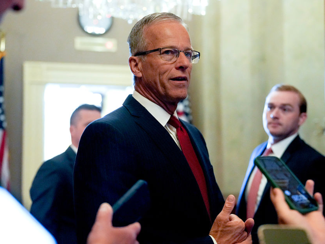 GettyImages-2218046329 Senate Majority Leader John Thune, a Republican from South Dakota, speaks to members of th