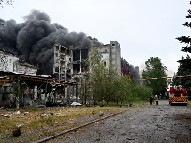 gettyimages-2218330405-1-640x480-1 Firefighters extinguish a fire at a civilian plant following Russian powerful attacks to U