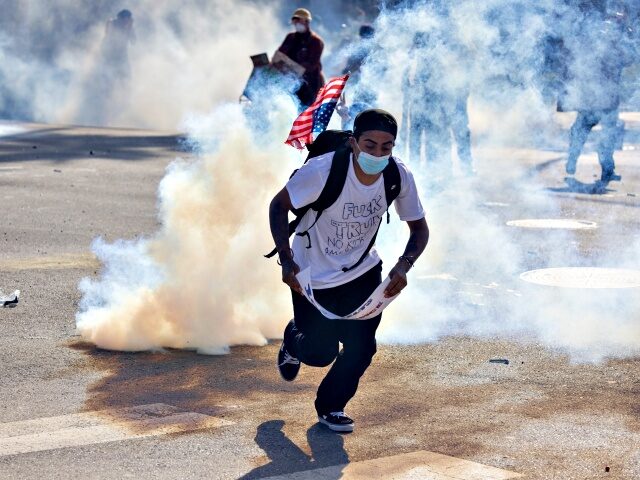Anti-Trump "No Kings" Protests Pop Up Across The Country LOS ANGELES, CALIFORNIA - JUNE 14: Sheriff deputies repeatedly shoot people with less-than