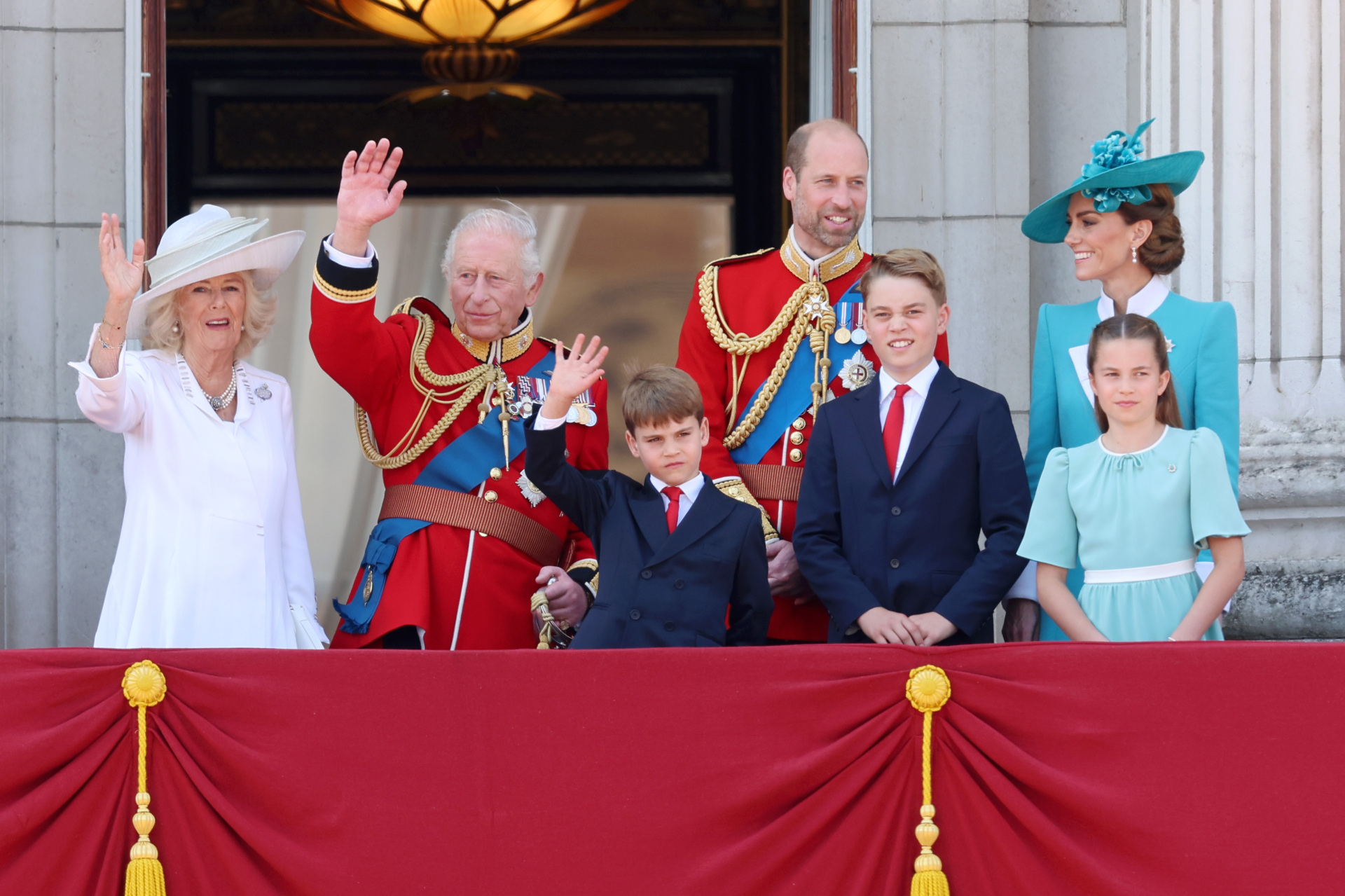 gettyimages-2220100291 LONDON, ENGLAND - JUNE 14: Queen Camilla, King Charles III, Prince Louis of Wales, Prince William, Prince of Wales, Prince George of Wales, Catherine, Princess of Wales and Princess Charlotte of Wales wave from the balcony at Buckingham Palace during Trooping The Colour 2025 on June 14, 2025 in London, England. Trooping The Colour is a ceremonial parade celebrating the official birthday of the British Monarch. The event features over 1,400 soldiers and officers, accompanied by 200 horses. More than 400 musicians from ten different bands and Corps of Drums march while performing. (Photo by Chris Jackson/Getty Images)