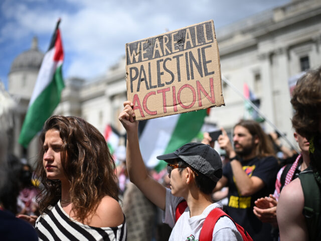 gettyimages-2220959311-1-640x480-1 LONDON, ENGLAND - JUNE 23: A protester holds a sign reading 'We are all Palestine Action'