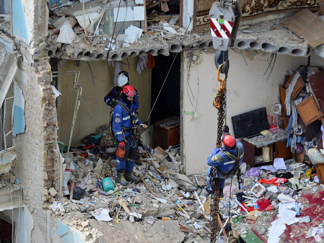 Ukrainian rescuers conduct a search operation in a KYIV, UKRAINE - 2025/06/23: Ukrainian rescuers conduct a search operation in a residential