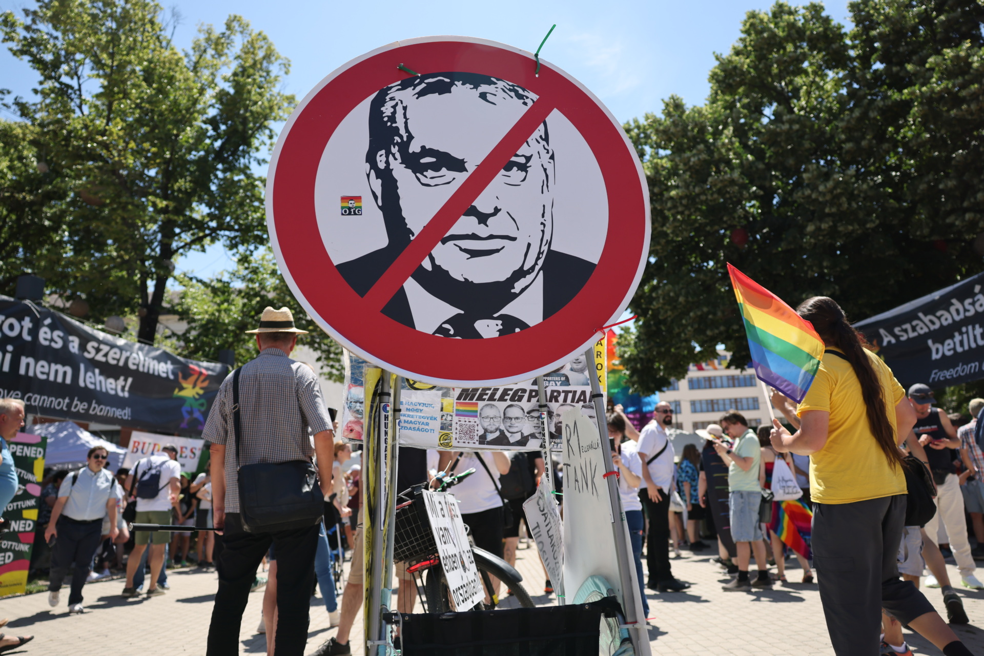 gettyimages-2221727370 BUDAPEST, HUNGARY - JUNE 28: A banner shows Viktor Orban at the beginning of the Budapest Pride on June 28, 2025 in Budapest, Hungary. Early in 2025, Hungary passed a law restricting the freedom of assembly by connecting it to a previous law from 2021 prohibiting the public portrayal to children of 'divergence from self-identity corresponding to sex at birth, sex change or homosexuality'. Consequently, events such as Pride marches are illegal in the country. The LGBTQ+ community are defying the ban and holding their Pride event on the streets of Budapest. (Photo by Janos Kummer/Getty Images)