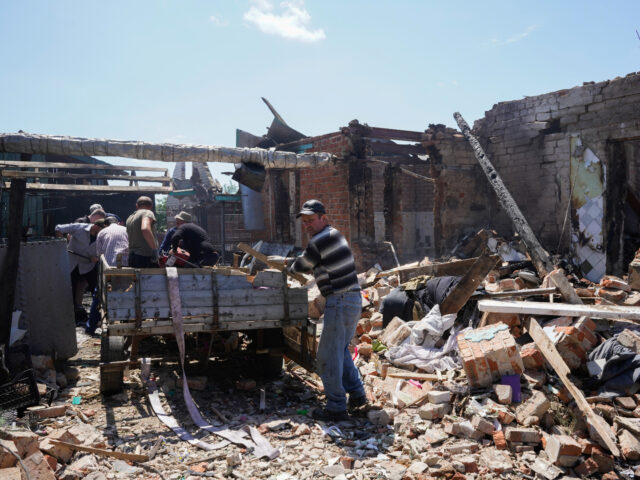 gettyimages-2222102449-1-640x480-1 VELYKYI BOBRYK, UKRAINE - JUNE 24: Local residents clean up debris from the yard of house