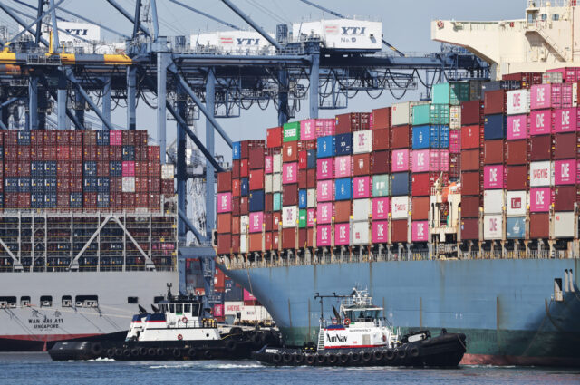California Ports See Increase In Traffic Ahead Of China Tariff Hikes LOS ANGELES, CALIFORNIA - JUNE 25: Shipping containers are stacked on container ships at t