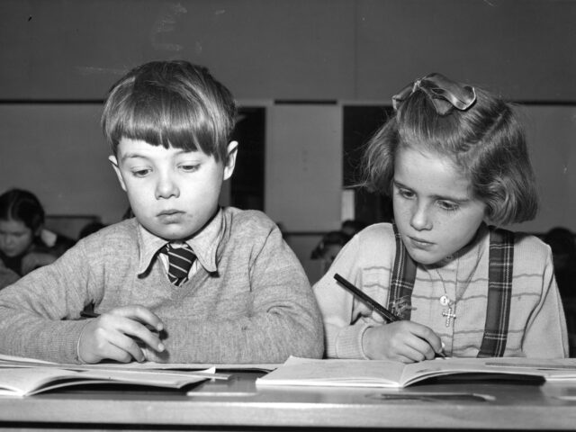 10th January 1956: Two pupils from Putney Vale Heathmere Primary School, hard at work at t