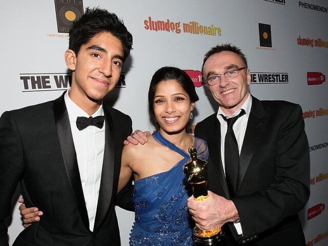 GettyImages-84990129 Actors Dev Patel, Freida Pinto and director Danny Boyle attend the Official "Slumdog Milli