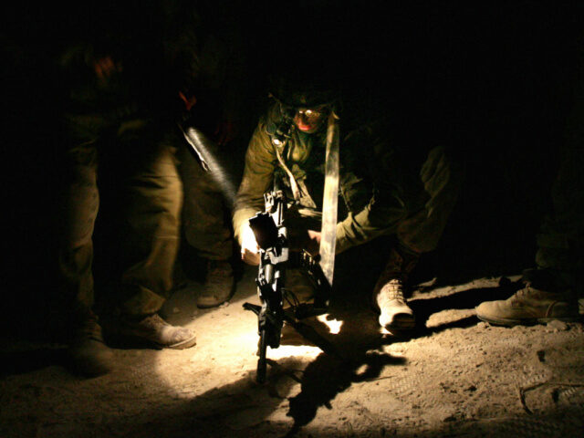 Israeli Commandos Inside Iran An Israeli soldier checks his weapon along the Israeli-Lebanese borders as he and his comr
