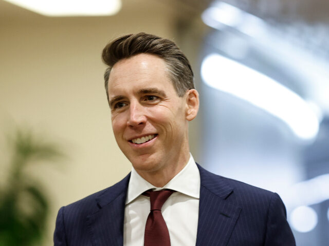 Josh Hawley WASHINGTON, DC - NOVEMBER 16: Sen. Josh Hawley (R-MO) walks through the Senate Subway to p
