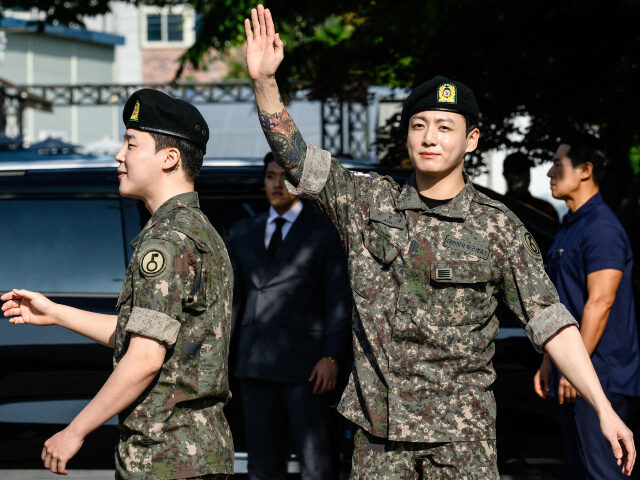 K-pop supergroup BTS members Jungkook (R) and Jimin (L) Jungkook (R) and Jimin (L) of K-pop supergroup BTS waves as they depart from an outdoor sp