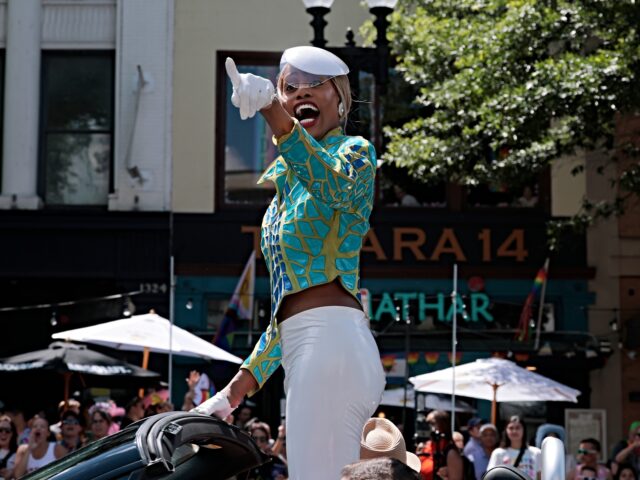 Laverne Cox WASHINGTON, DC - JUNE 07: Laverne Cox waves as her vehicle makes its way along the parade