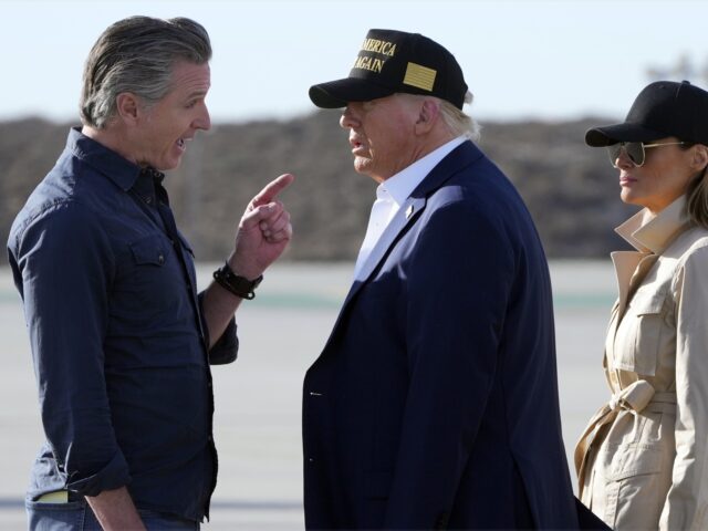 Newsom vs. Trump (Mark Schiefelbein / Associated Press) FILE - President Donald Trump and first lady Melania Trump listen to California Gov. Gavin
