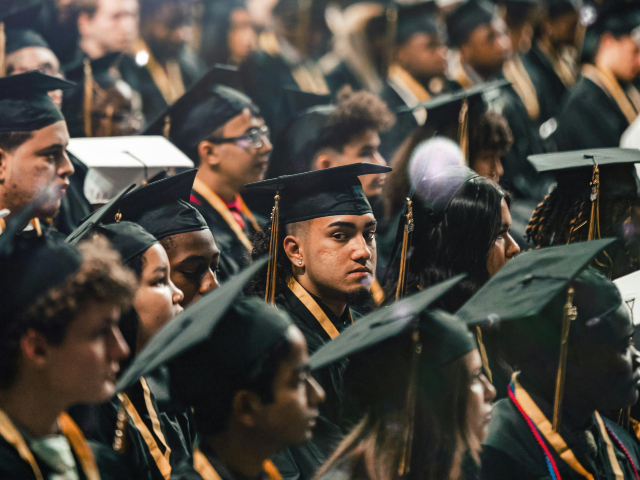 pexels-cao-vi-ton-449370203-17157529 Crowd of Graduates in Academic Gowns