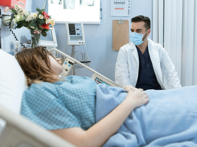 pexels-rdne-6129651 Doctor talking to a Patient