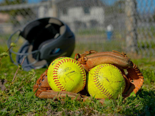 pexels-tejanotechie-26619470 Balls on Glove on Grass