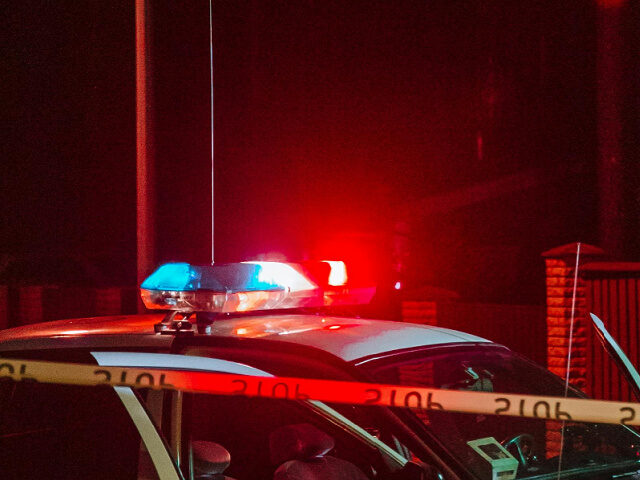 police-car-lights-crime-scene-tape-stock-pexels-cottonbro crime scene tape and police vehicle lights