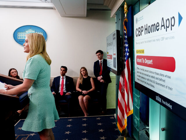 self-deportations A monitor displays a new U.S. Customs and Border Protection app with "a self-deportat