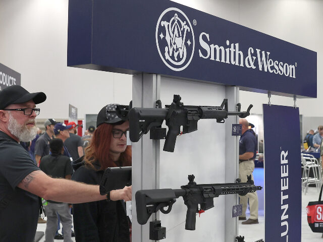 Smith & Wesson Attendees visit the Smith & Wesson booth during the National Rifle Association (NRA) A