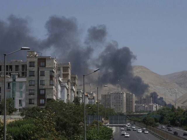 Tehran burning (Vahid Salemi / Associated Press) Smoke rises from an oil storage facility after it appeared to have been struck by an Israe